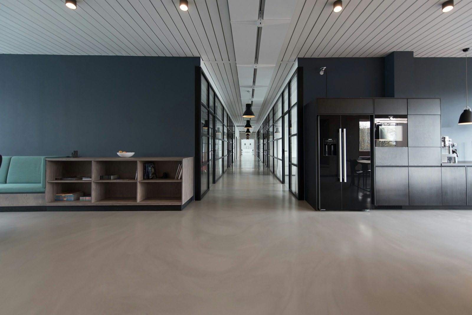 Riverfront creative studio workspace with warm editorial lighting